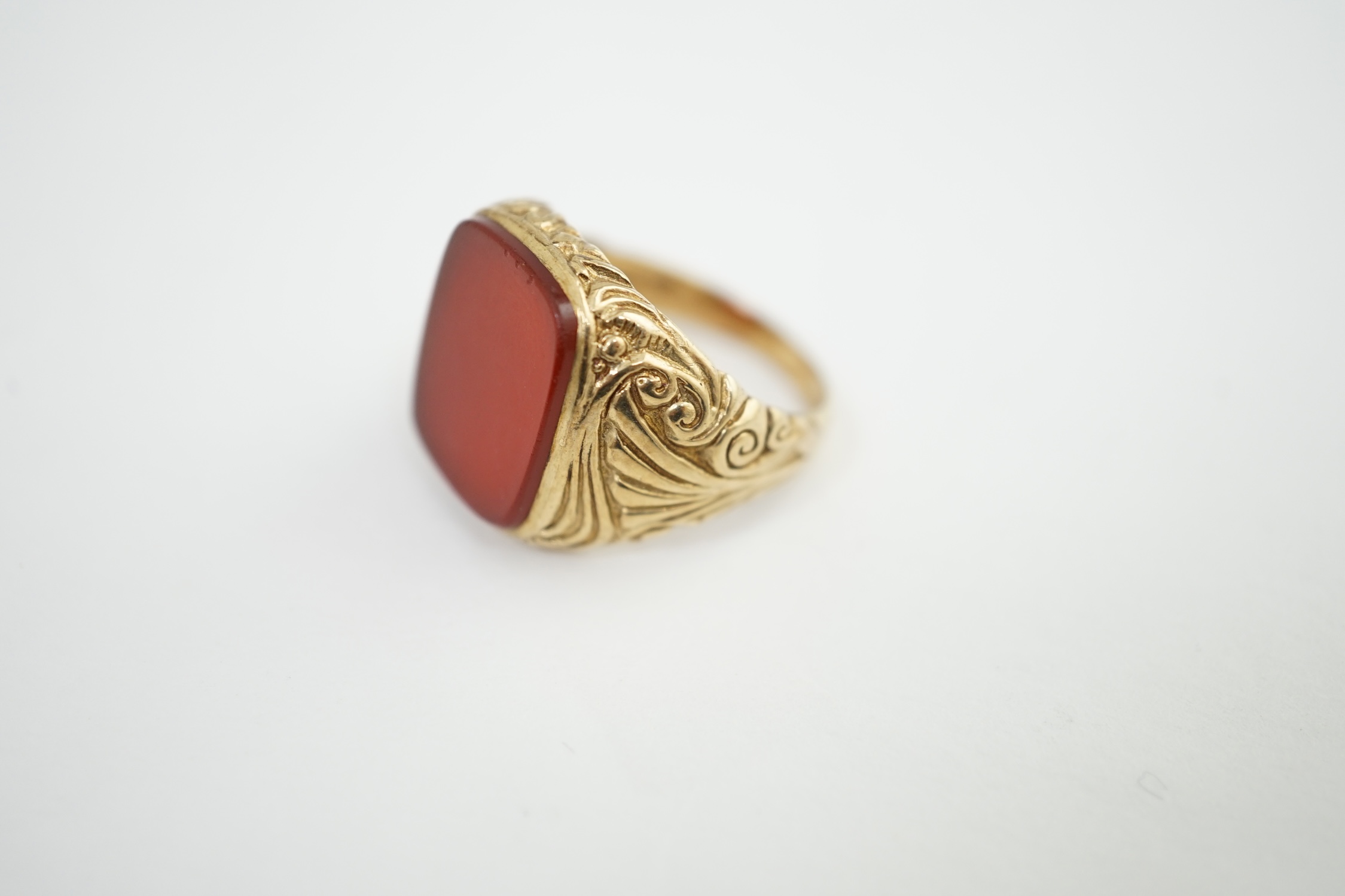 A 1970's Victorian style 9ct gold and carnelian set signet ring